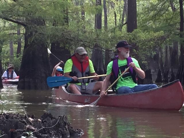 Canoe paddlers on the Neches River Rally route