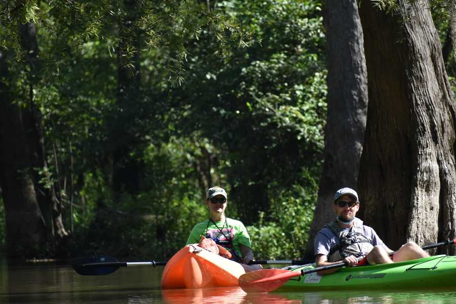 kayakers chilling by a cypress by Tara Nicole Bryant